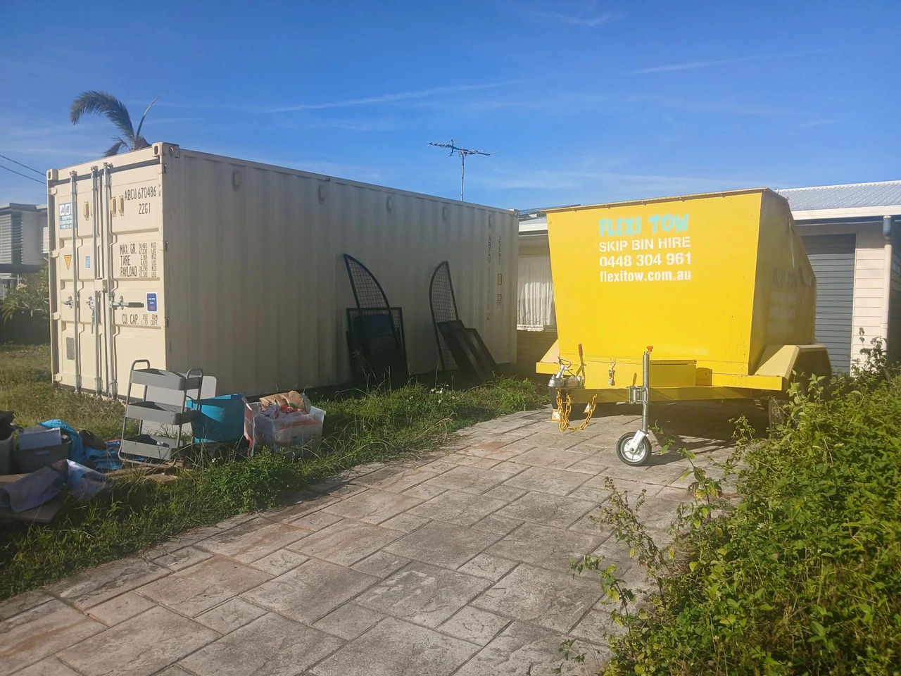 Flexi Tow skip beside a Mackay home